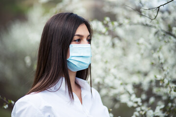Portrait of woman with mask on face outdoor