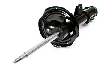 Front strut hydraulic shock absorber with fastening loops and coil spring seat. Vehicle suspension...