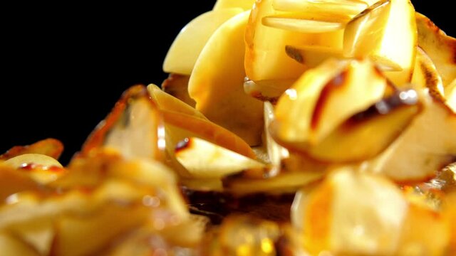 Rhinestone amber desert rose sample of yellow and white colours under electric light zoom out. Concept gemstone exhibition