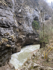 Fototapeta premium Beautiful landscape of mountain river in amazing and mysterious nature. Mountain waterway flowing through mountainous terrain.