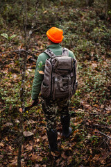 Naklejka premium Man Hunting in forest
