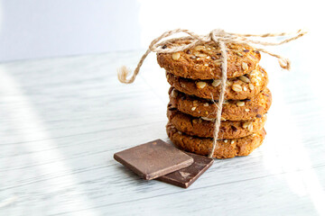 Oatmeal cookies in a stack tied by a thread. close-up. Diet product. Cereal food