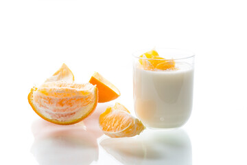homemade sweet yogurt in a glass with oranges