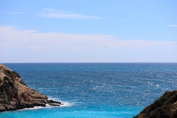 Fototapeta na wymiar cliffs at the coast of azure mediterranean sea