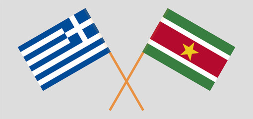 Crossed flags of Suriname and Greece. Official colors. Correct proportion