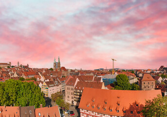 Aerial view of Nuremberg medieval skyline from drone at sunset, Germany.