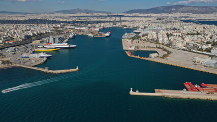 Aerial drone panoramic photo of famous and busy port of Piraeus where passenger ships travel to popular Aegean destinations, Attica, Greece