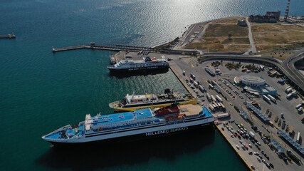 Aerial drone panoramic photo of famous and busy port of Piraeus where passenger ships travel to...