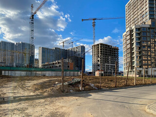 Construction of a new district of a quarter of a modern city with new construction of houses and...