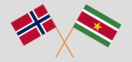 Crossed flags of Norway and Suriname. Official colors. Correct proportion