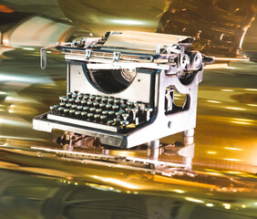 Old typewriter. an old typewriter. on a dark BACKGROUND