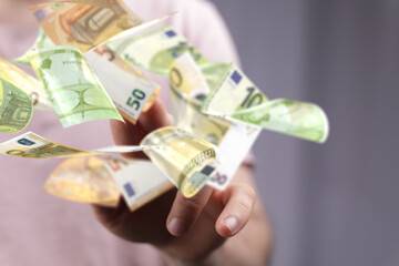 bill euro banknote in hand rain