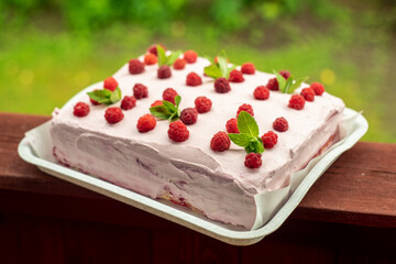 Sponge cake with raspberries of our own production.