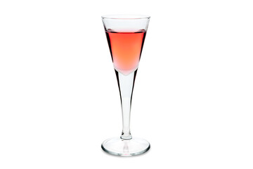 Rosolio, typical Italian liqueur distilled from roses in shot glass isolated on white. Copy space