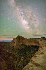 Fototapeta na wymiar The Milky Way rising over a red rock desert landscape