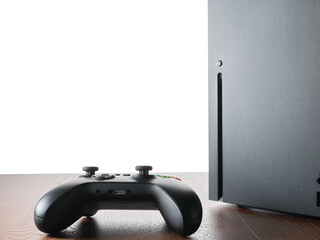 Gamepad and console on table with isolated background © olegkruglyak3