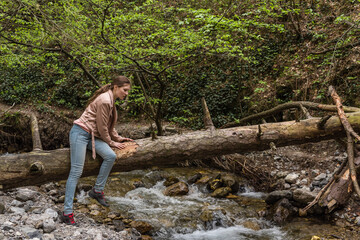 camping, travel, tourism, hike and people concept - happy girl