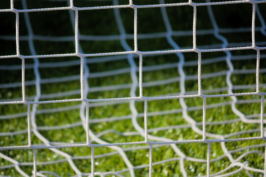 Image of the net of the goal of a soccer field