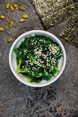 Chuk seaweed salad and sesame seeds. Chinese cuisine.