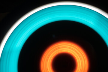 Long exposure photo two light sources red and blue in motion