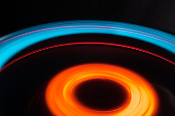 Long exposure photo two light sources red and blue in motion