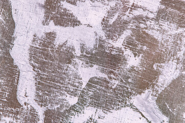 abstract colorful creative background - rough linen canvas unevenly covered with multi-colored primers, reflections of light. Toning, blur. Temporary object.