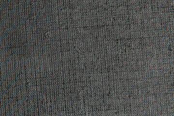 dark creative background: black primed linen canvas, uneven lighting, toning