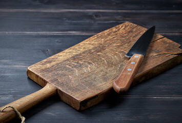 empty wooden cutting board and knife