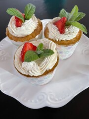 Strawberry shortcake cupcakes with fresh mint