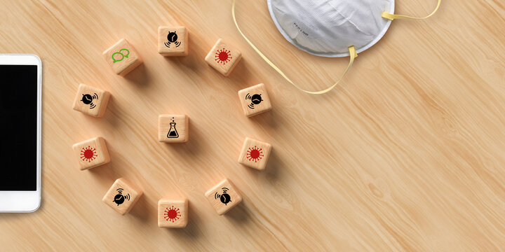 cubes with virus and chemistry symbols on wooden background