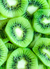 Sliced kiwi as background