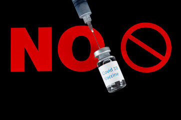 Covid 19 Vaccine Bottle with Needle and Syringe on a NO sign