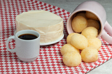 Cheese bread, Brazilian typical snack, with cup of coffee.