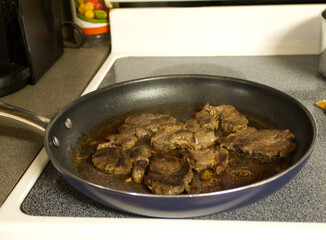 frying pan with meat