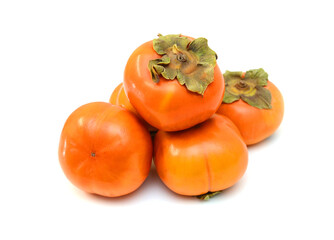 Slice and whole persimmon  isolated on white background