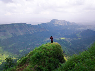 hiker on top of mountain