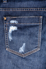 Blue worn jeans pocket close up, ripped jeans pocket background, dark blue damaged denim backdrop, torn jeans pocket pattern, shabby indigo color jeans cloth, grunge pants back, old vintage trousers