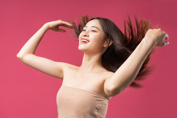 Beautiful Asian woman with flying hair