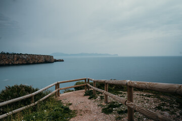Panorama of some mountain on fog.