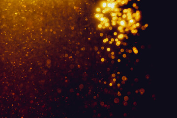 Fototapeta na wymiar Glittering stars of blur gold bokeh