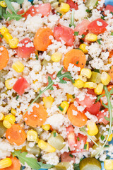 Salad with vegetables and couscous groats. Light meal containing healthy vitamins and minerals