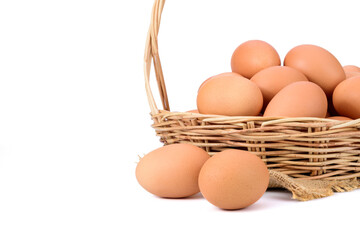 Fresh eggs from organic farms Put it on the floor and put it in the basket. Isolated on white background