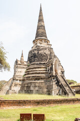 Fototapeta premium Old pagodas within Wat Phra Si Sanphet was the holiest temple in Ayutthaya that is ancient capital of Thailand
