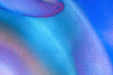 Art under ground. Beautiful street art graffiti background. The wall is decorated with abstract drawings house paint. Modern style urban culture of street youth. Abstract picture on wall