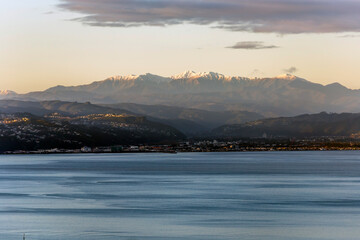 Snowy mountains view from Wellington, New Zealand