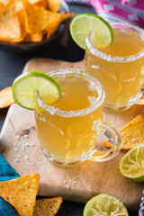 Mexican alcohol cocktail chelada with light beer and lime juice