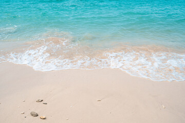 Fototapeta na wymiar Blue sea with white beach in summer