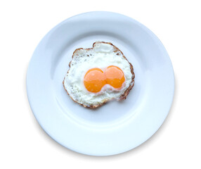 Twin Fried Eggs on white plate isolated on white background.