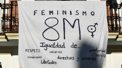 Bedsheet announcing Inteernational womens day in Andalusian village