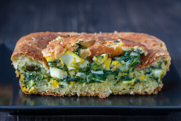 Pouring pie with wild garlic and egg